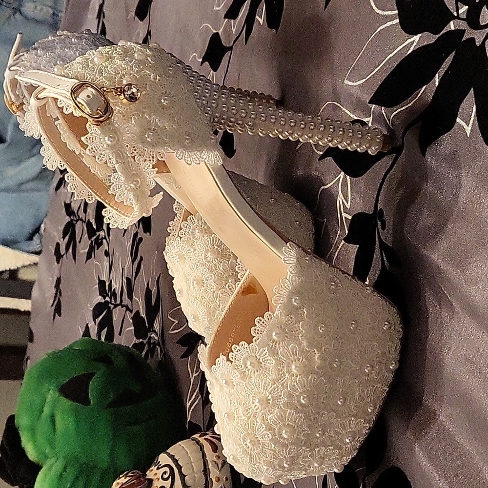 4 inch stelleto's covered in pearls.